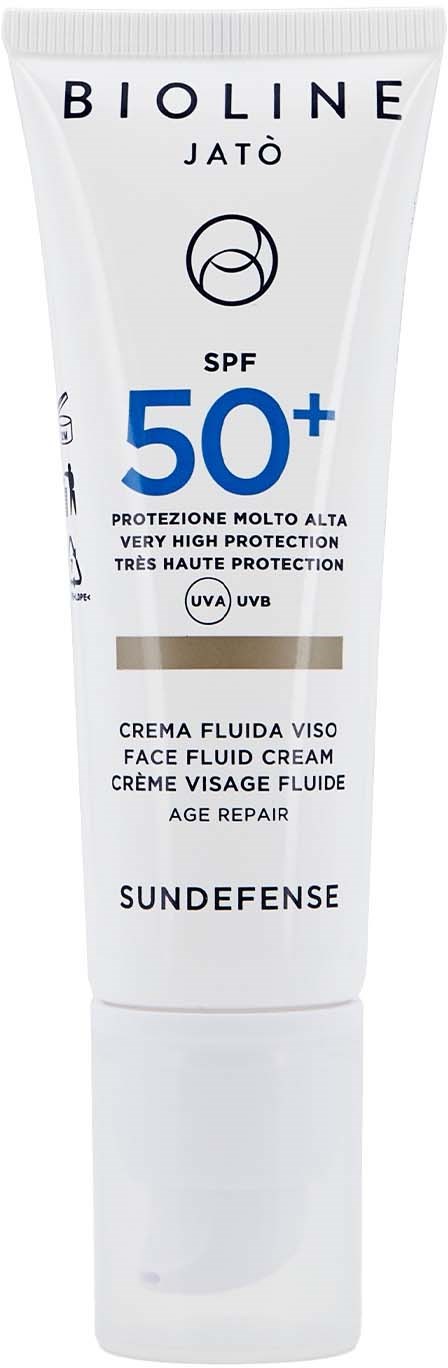 En vit tub med ansiktskräm med SPF 50+ för skydd och åldringsreparation. Märket är Bioline Jato.