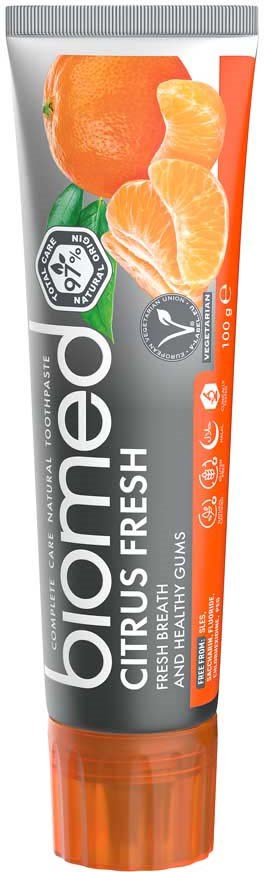 A tube of bio-neo citrus fresh toothpaste with images of an orange and a mandarin on the packaging.