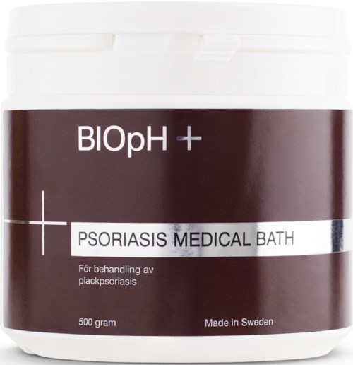 En vit burk med en mörk etikett, skriver i vitt och svart, för psoriasisbehandling, tillverkad i Sverige, innehåller 500 gram.