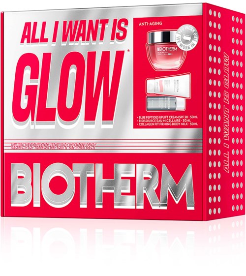 Biotherm hudpleie gaveeske med anti-aging krem, kroppsmelk og en liten tube. Lysende rød emballasje med fet hvit og sølv tekst.