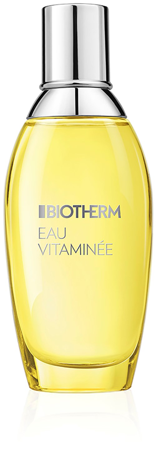 En gul flaska med silverlock, märkt "BIOTHERM EAU VITAMINÉE," troligen en parfym eller hudvårdsprodukt.