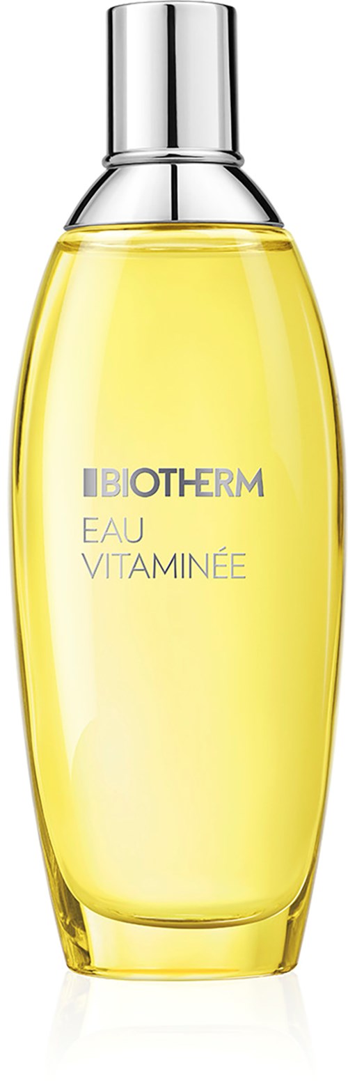 En tydlig gul flaska med silverlock märkt Biotherm Eau Vitaminée, troligen en hudvårdsprodukt.