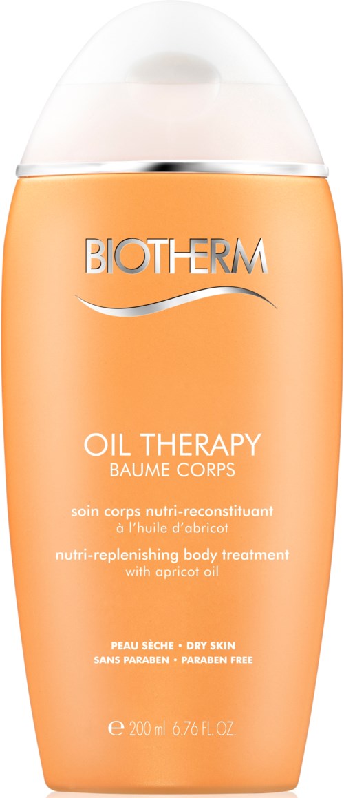 En orange kroppslotionflaska med vit lock, märkt 'Biotherm Oil Therapy' för torr hud.
