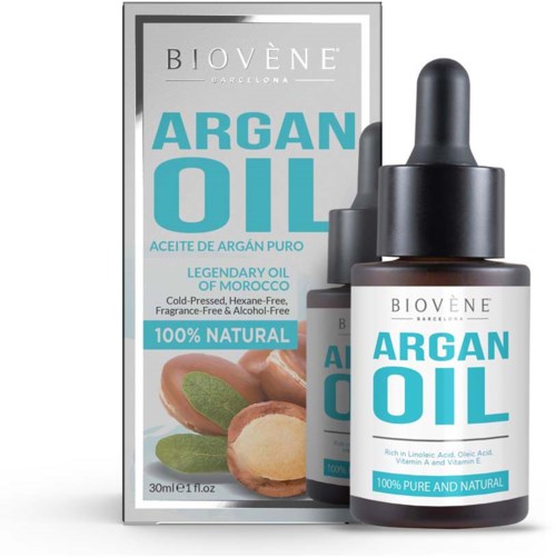 Butelka i opakowanie oleju arganowego Biovène, oznaczone jako 100% naturalne, czyste i z Maroka, z migdałami i orzechami arganowymi.