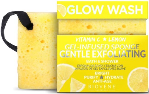 Ein gelber Schwamm mit schwarzen Riemen und bunter Verpackung, die einen Zitronen- und Vitamin C-Glow-Wash-Schrubber bewirbt.