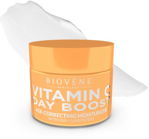 Orange burk av Biovene Vitamin C Day Boost ansiktskräm med UVA och UVB-filter, framför en vit bakgrund.