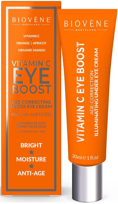 Hellorangene Tube und passende Verpackung für Augencreme, Etikett zeigt Schlüsselzutaten wie Vitamin C, Orange, Aprikose und Mango.