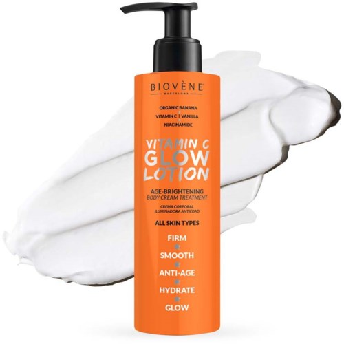 Orangenflasche mit Biovène Vitamin C Glow Lotion und Text, vor weißem Hintergrund.