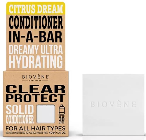 Eine Schachtel Biovène Conditioner und eine weiße Box mit Biovène-Logo. Conditioner spendet Feuchtigkeit und schützt alle Haartypen.