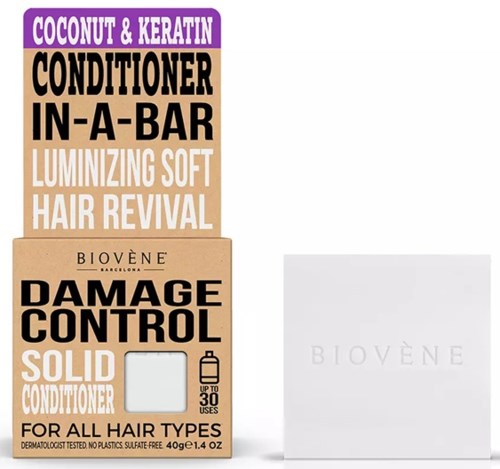 Verpackung mit Text für Haarconditioner, erwähnt Kokosnuss, Keratin, Schadenkontrolle und weiches Haarwiederbelebung.