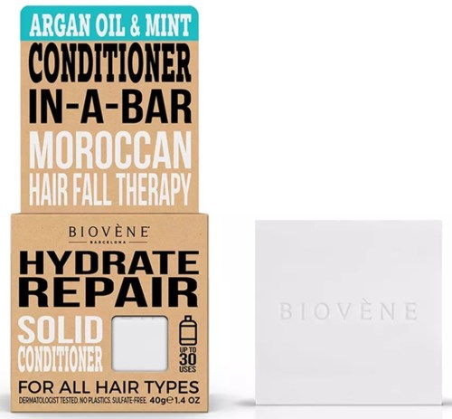 Eine Box mit der Aufschrift 'Biovène Hydrate Repair Solid Conditioner' mit Text über Arganöl, Minze, marokkanische Therapie und Haarpflege.