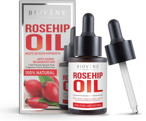 Boxen und Flaschen mit Hagebuttenöl, mit Pipetten, fördert natürliche und Anti-Aging-Hautpflege.