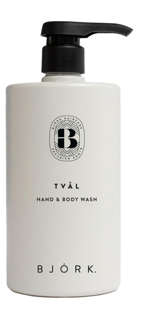 Eine weiße Flasche mit schwarzem Pumpkopf, beschriftet 'Björk' und 'Hand & Body Wash'.