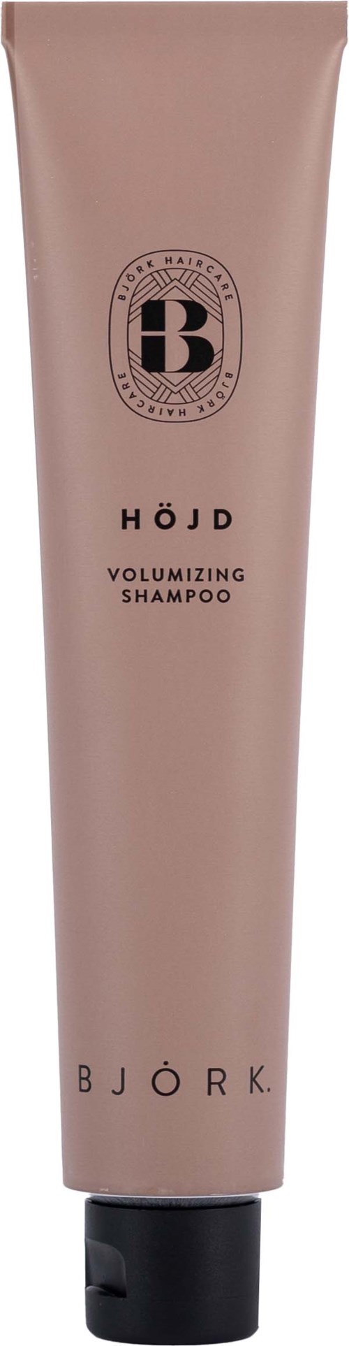 Ein beiger Tube mit Bjørek Volumen-Shampoo, mit schwarzem Deckel und schlichten Texten.