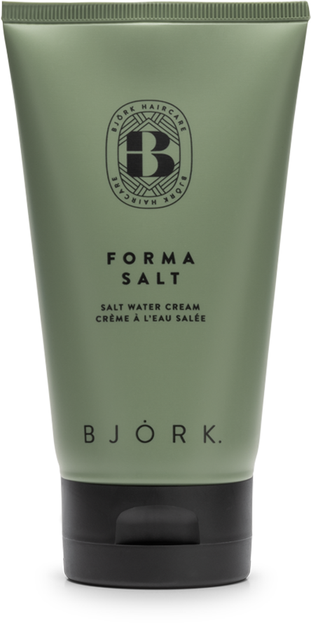 Eine grüne Tube mit Bjork Forma Salt Salz-Wassercreme mit schwarzem Deckel und einfachem Etikett. Das Etikett hat den Markennamen und Produktdetails.