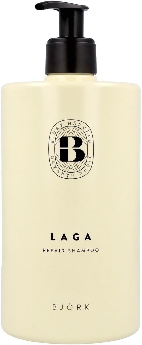 En beige schampoflaska med svart pump, med svart och vitt text och logo.