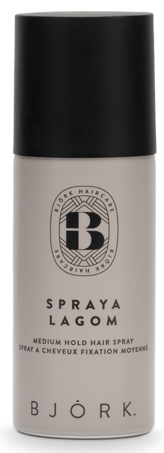En grå sprayflaska med svart lock och Bjork-logotyp, märkt som hårspray för medium hållbarhet.