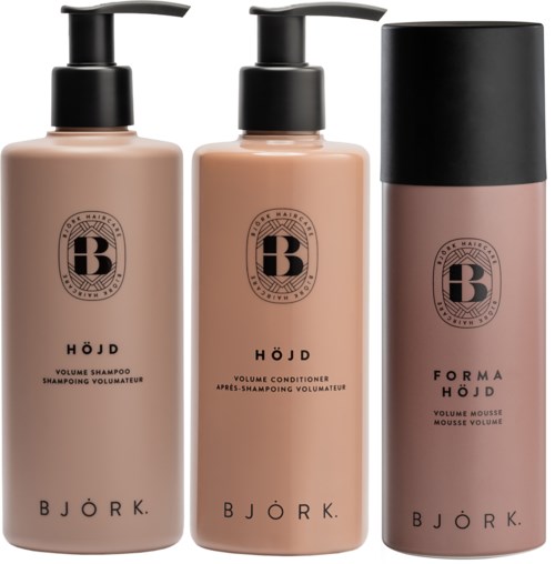 Drei Haarpflegeprodukte: Shampoo, Conditioner und Mousse, in beiger und schwarzer Verpackung von Björk.