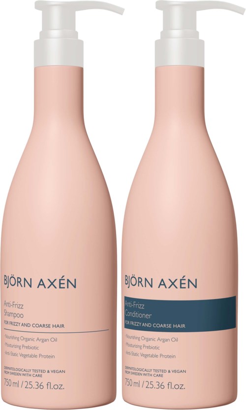 Twee roze flessen van Björn Axén haarverzorgingsproducten, shampoo en conditioner, met pompdispenser.
