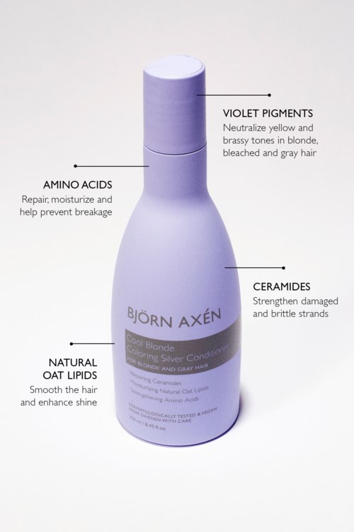 Fles met labels voor violet pigmenten, aminozuren, ceramides en natuurlijke haverlipiden. Beschrijft haarverzorgingsvoordelen.