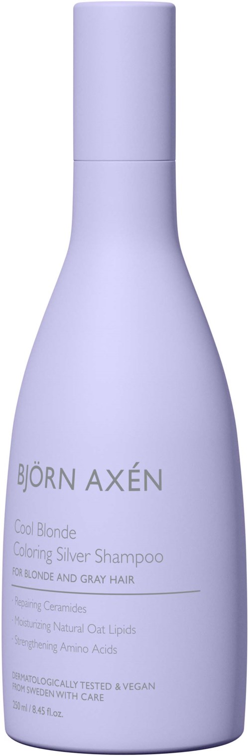 Een lichtpaarse fles Björn Axén zilvershampoo voor blond en grijs haar, met tekst die de functies beschrijft.