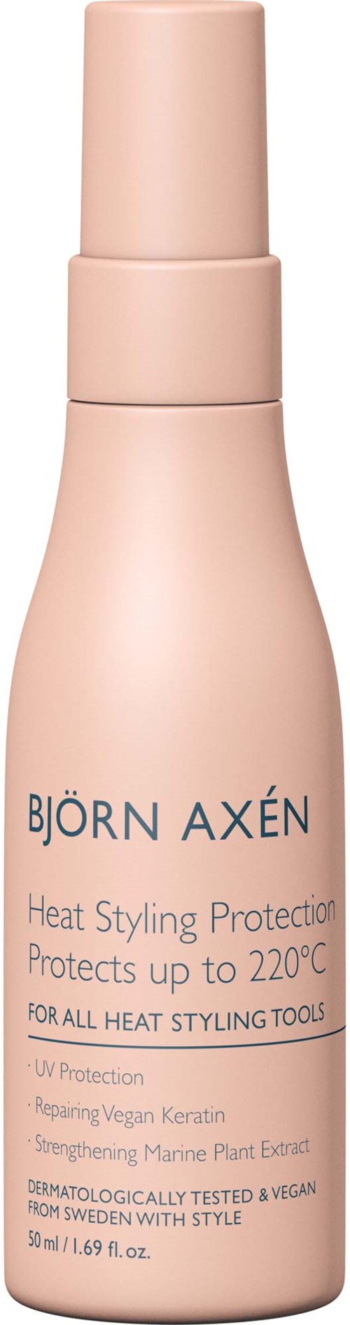 Pink bottle with text for heat protection spray, named Björn Axén, for styling tools, vegan, and tested.