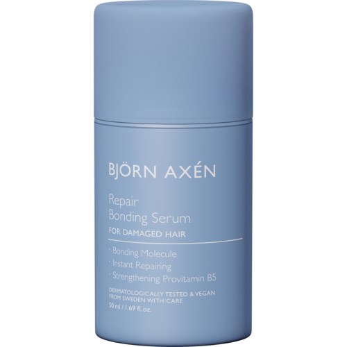 Een blauw flesje met Björn Axén Repair Bonding Serum voor beschadigd haar met versterkende ingrediënten.