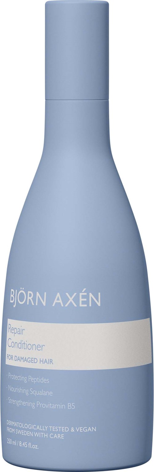 Blauwe fles van Björn Axén Repair Conditioner voor beschadigd haar. Het is veganistisch en getest op effectiviteit.