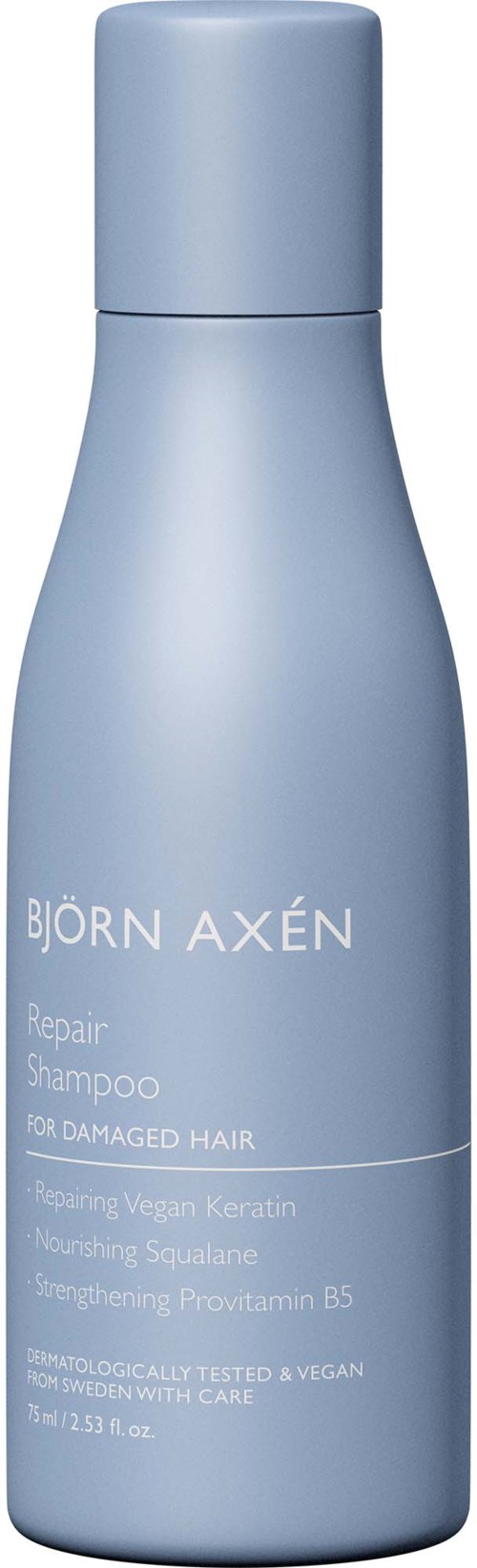 Een lichtblauwe fles Björn Axén Repair Shampoo voor beschadigd haar met veganistisch keratine en squalane.
