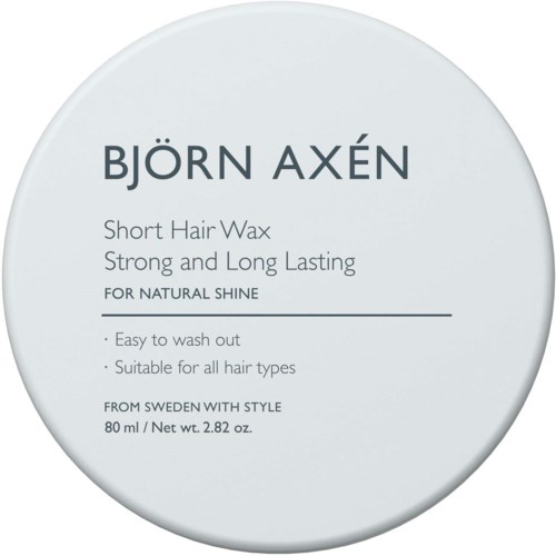 Dit is een ronde etiket voor Björn Axén haarwacom, dat aangeeft dat het voor een natuurlijke glans is, gemakkelijk uit te wassen en geschikt voor alle haartypes.
