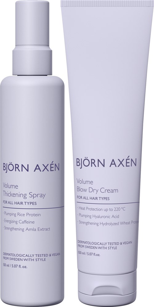 Zwei weiße Flaschen Haarprodukte von Björn Axén, eine Spray und eine Creme, mit blauer Schrift, für alle Haartypen.