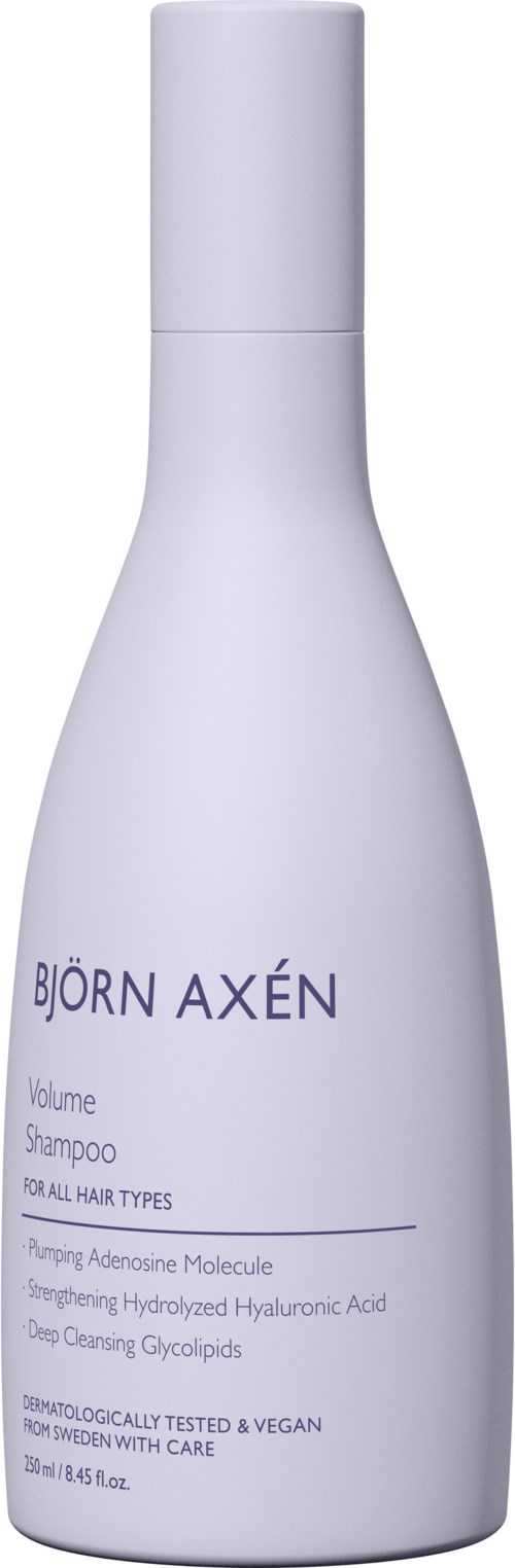 Een witte fles Bjorn Axen volume shampoo voor alle haartypes. Bevat ingrediënten zoals hyaluronzuur en glyceriden.