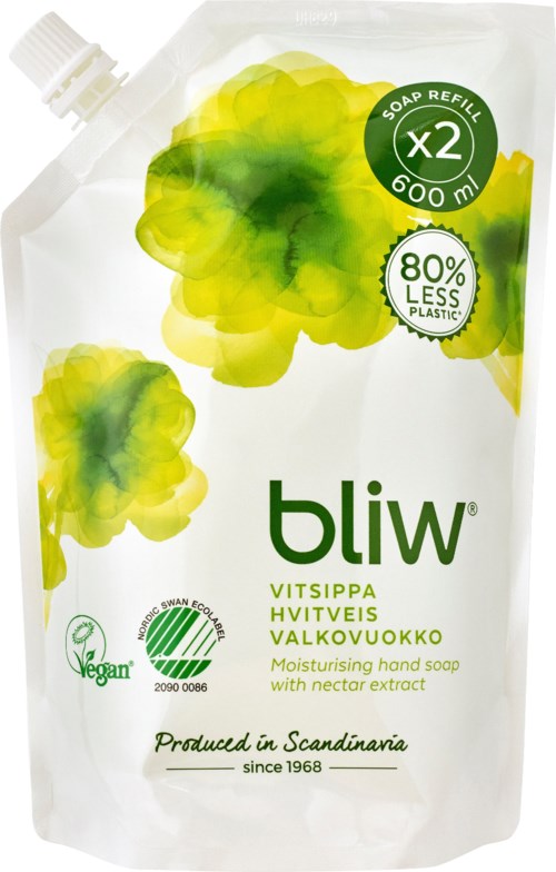 Joustava valkoinen käsisaippuan täyttöpusse, vihreä ja keltainen muotoilu, sisältää tuotetiedoja ja ekologisia merkkejä.