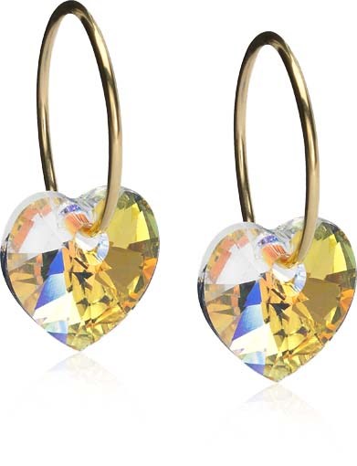 Gold hoop earrings with large yellow heart-shaped gems.