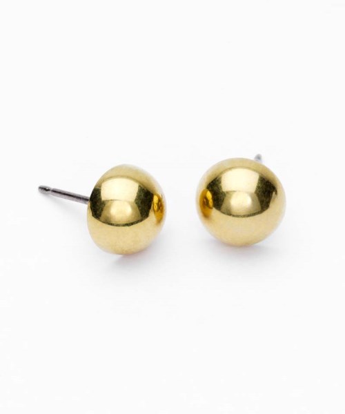 A pair of shiny gold spherical earrings with a small post on one. Simple and elegant jewelry pieces.