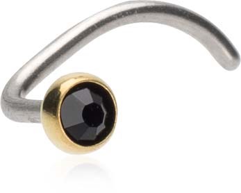 A silver nose ring with a black gem in a gold setting on one side.