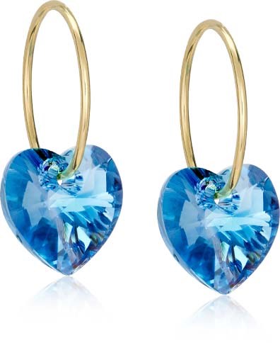 Gold hoops with blue heart-shaped gemstones hanging from each earring.