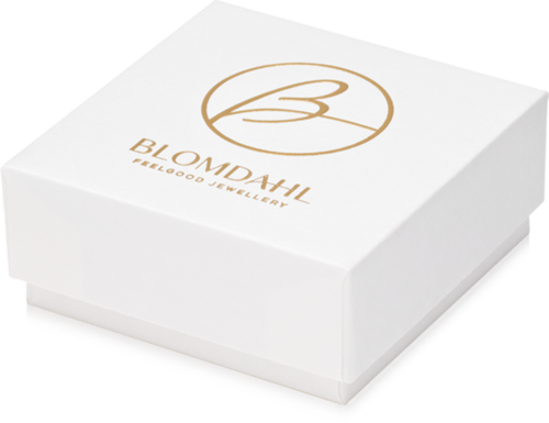A white jewelry box with a gold logo and text that says 'BLOMDAHL FINE FOOD JEWELLERY' on top.