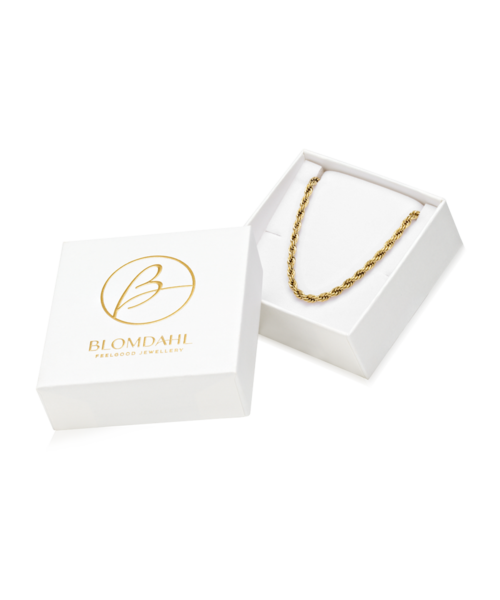 Gold necklace inside a white box with a lid, which has a gold logo and text on top.