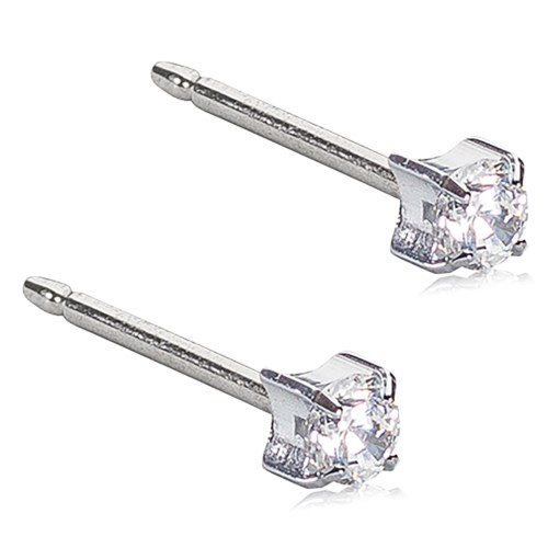 Silver stud earrings with clear gemstones. Small, simple jewelry for ears. Elegant and shiny design.