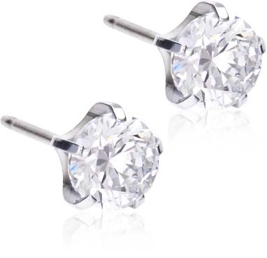 Pair of silver earrings with large, shiny, round diamonds.