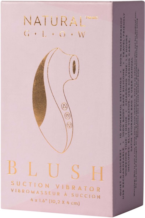 Die Verpackung ist rosa mit goldenen Details und zeigt ein Gerät mit Tasten. Es trägt die Bezeichnung "Blush" und erwähnt einen Saugvibrator.