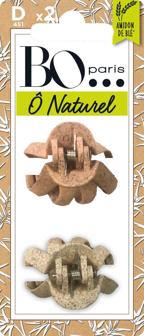 Packaging for natural bath sponges with two brown and beige sponge shapes. Includes French text and a decorative background.