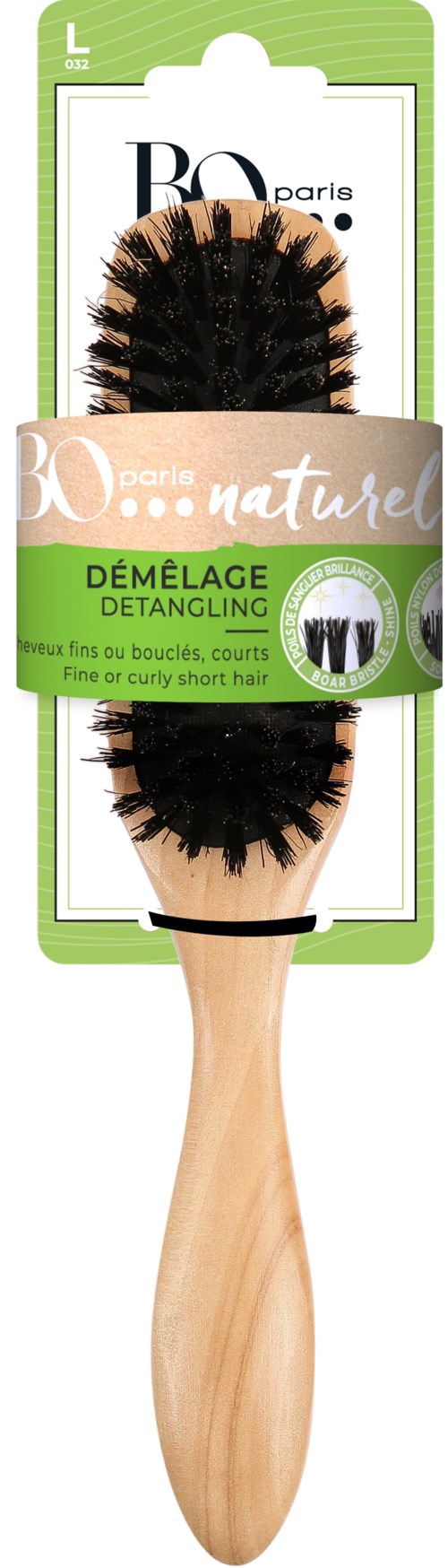 A wooden hairbrush with black bristles in packaging labeled 'Démêlage Detangling'.