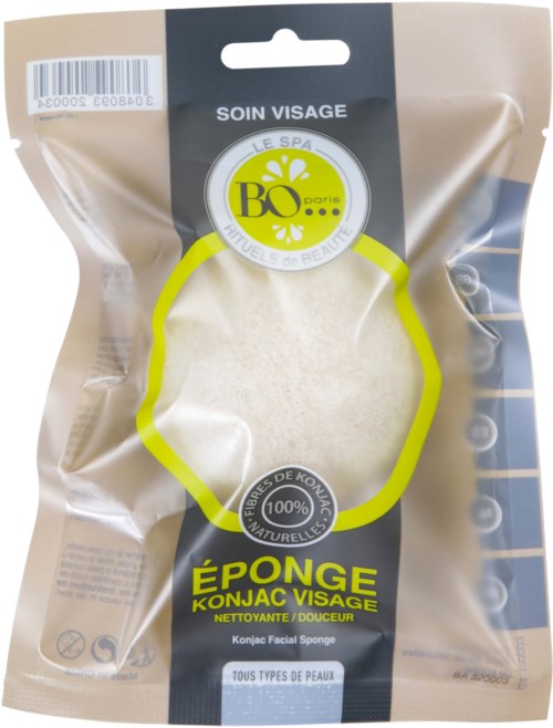 A konjac facial sponge in clear packaging with yellow and black label, suitable for all skin types.