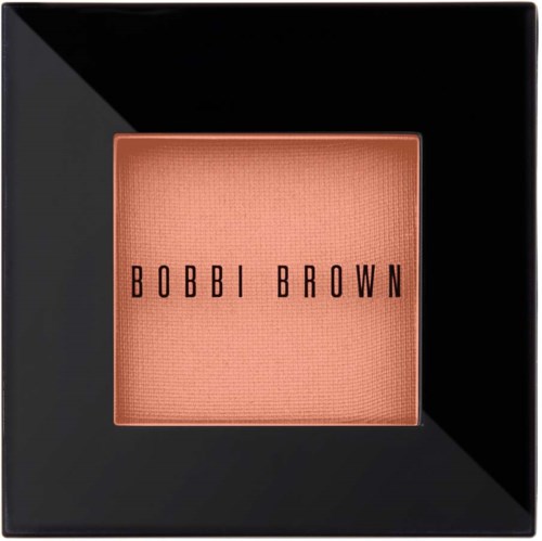 A square pink blush in black packaging with 'BOBBI BROWN' written on the front.