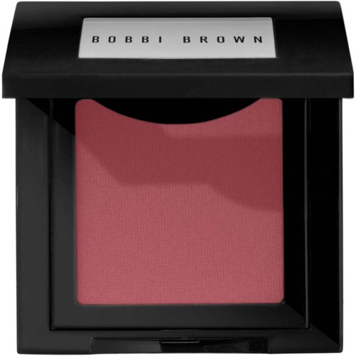 A pink blush makeup in a black compact with white label reading 'BOBBI BROWN' on top.