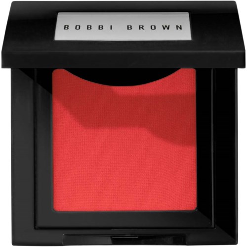 A compact red blush in a black square container with a lid and a label that reads 'BOBBI BROWN.'
