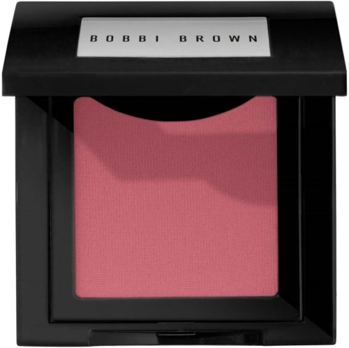 A pink blush in a black compact with a clear lid showing the brand Bobbi Brown.