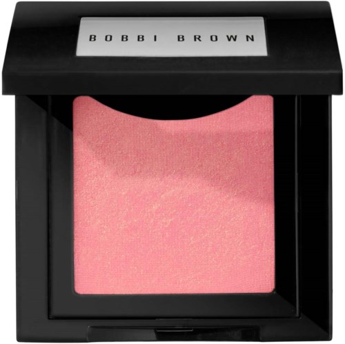 A pink blush in a black compact with a clear lid and the name "Bobbi Brown" on top.